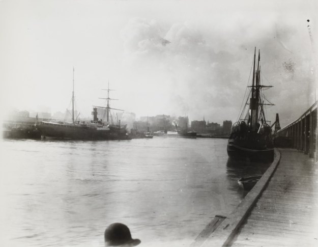Black and white image depicting sailing ships and steam ships at Victoria Dock, circa 1905