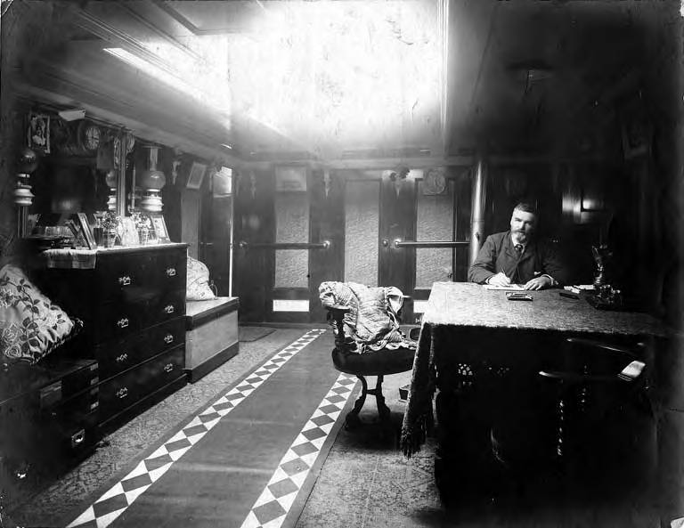 Wilhelm Hester, man, interior of ship, about 1900