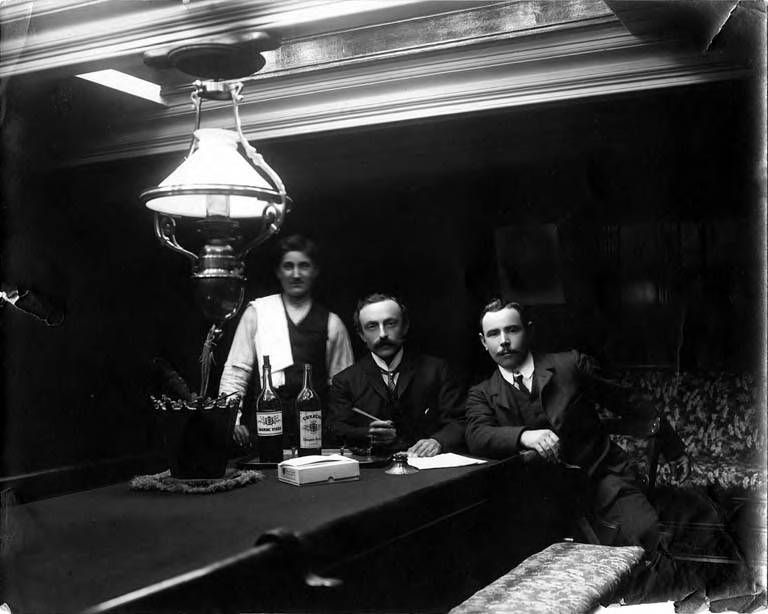 Wilhelm Hester, three man, ship's interior, about 1900